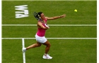 BIRMINGHAM, ENGLAND - JUNE 11: Francesca Schiavone of Italy in action against Sloane Stephens of the USA during day three of the Aegon Classic at the Edgbaston Priory Club on June 11, 2014 in Birmingham, England. (Photo by Paul Thomas/Getty Images)